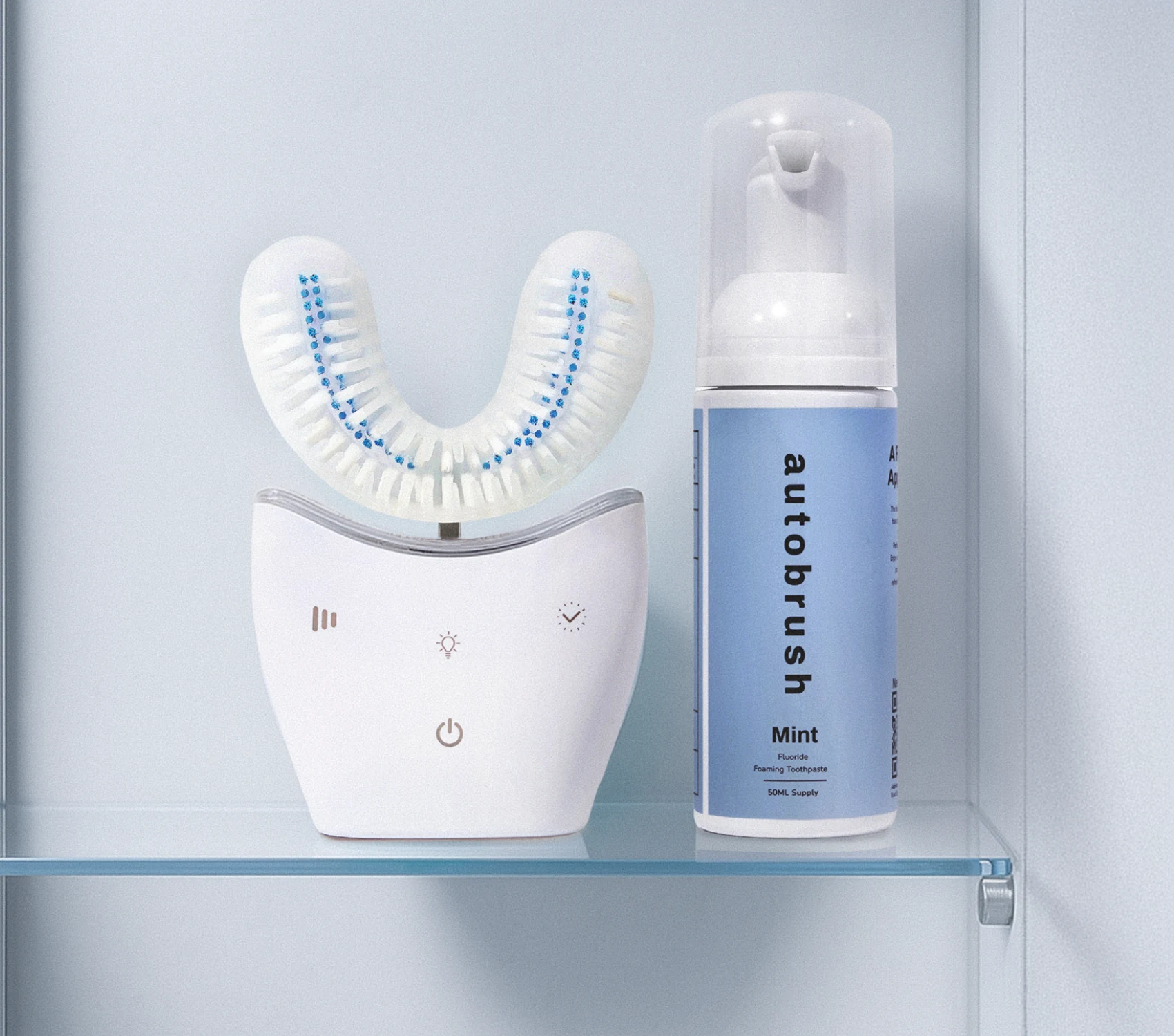 Autobrush Sonic Pro white electric toothbrush with foaming toothpaste