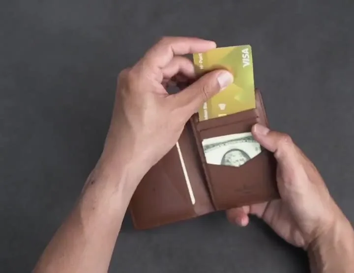 Traveler at airport security with wallet RFID protection