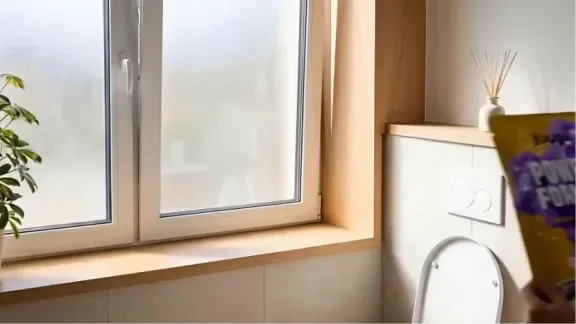 Purple Fuugu foam climbing up toilet bowl walls toward the rim